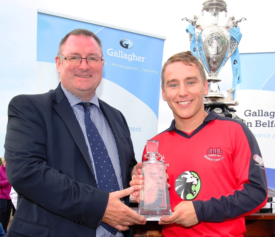 Neil Hunter, Gallagher Insurance, presenting the Man of the Match award to Adam Dennison, Waringstown